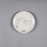 Plate with reclining woman