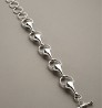 Bracelet « main et anneau » - argenté