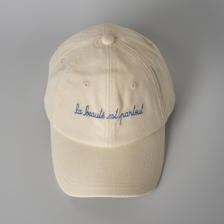 Embroidered beige cap