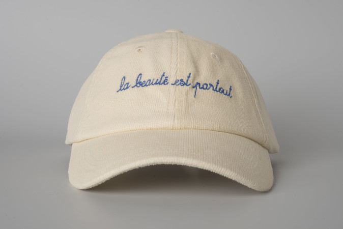Embroidered beige cap